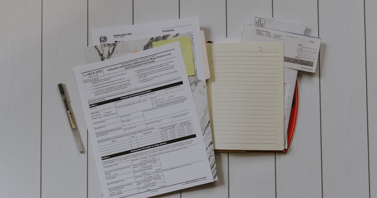 stack of papers flat lay photography