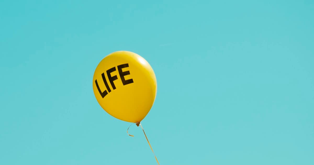 yellow life-printed balloon